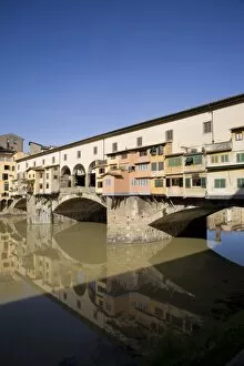 Reflection in the Arno River of the Ponte Vecchio, Florence, Tuscany, Italy, Europe