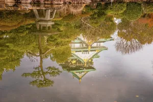 Stillness Prints: Reflection of the castle in a calm zen garden. Golden warm evening lights. Osaka, Japan