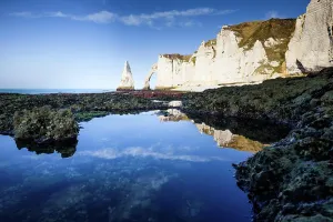 Etretat Prints: Reflection of cliffs and needle rock in tidal pools of Etretat in Normandy France during low tide