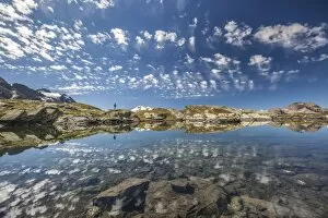 Images Dated 11th August 2011: The reflection of the Engadine sky in the the magic of the crystal-clear mountain lakes, Sils