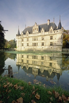 Chateau Prints: Reflection in lake of the chateau at Azay Le Rideau, one the chateaux of the Loire