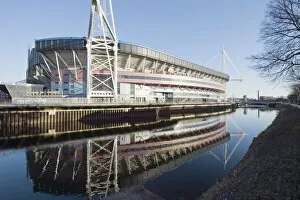 Images Dated 4th January 2010: Reflection of Millennium Stadium in River Taff, Cardiff, Wales, United Kingdom, Europe