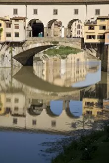 Reflection of the Ponte Vecchio in the Arno River, Florence, Tuscany, Italy, Europe