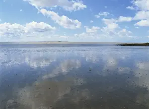 Charente Maritime Prints: Reflections of blue sky and white clouds in the Conche de Foncillon, at Royan