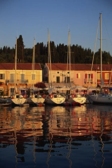 Cephalonia Prints: Reflections of boats in the evening at Fiskardo