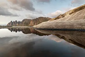 Tungeneset Prints: Reflections of clouds, rocks and Devil's Teeth Mountain in evening sunlight
