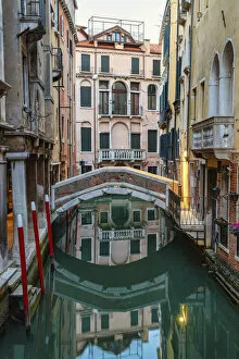 Connections Gallery: Reflections of houses and bridge in the canal, Sestiere San Marco, Venice