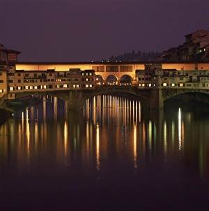 Reflections in the River Arno of lights on the Ponte Reflections in the River Arno of lights on the Ponte
