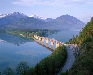 Reflections of a road bridge over Lake Sylvenstein