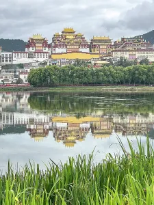 Meditation Prints: Reflections of Songzanlin Monastery on Lamuyangcuo Lake in Yunnan