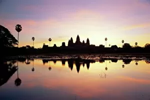 Images Dated 26th July 2008: Reflections in water in the early morning of the temple of Angkor Wat at Siem Reap