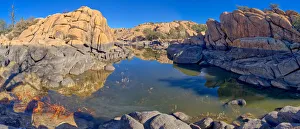 Lagoon Gallery: Reflective lagoon along East Bay Trail of Willow Lake, gray line on rock is where the water level