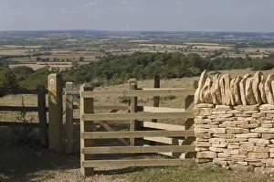 Gate Prints: Refurbished gate and dry stone wall on the Cotswold Way footpath
