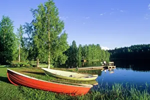 Finland Prints: Relaxation by the lake with boats and people enjoying nature in Northern Savonia Finland