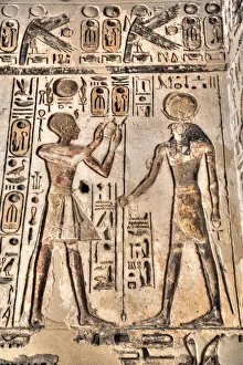 Relief, Pharaoh on left, God Horus on the right, Temple of Khonsu, Karnak Temple Complex
