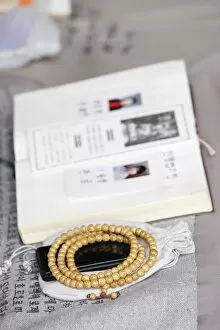 Religious book, prayer beads and mobile phone, s eoul, s outh Korea, As ia