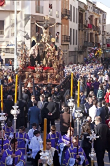 Religious float being carried through the streets during Semana Santa