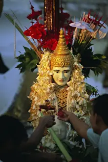 Human Face Prints: Religious offerings at the Shwedagon Paya (Shwe Dagon Pagoda), Yangon (Rangoon)