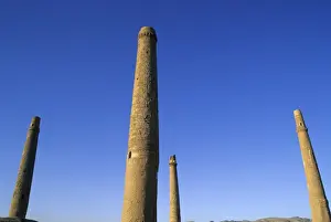 Four of the six remaining minarets marking the corners of the long gone Madrassa built by the last Timurid ruler Sultan Husain Baiquara, within the Mousallah Complex of Gaur Shads mausoleum, Herat