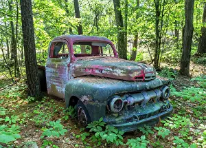Metal Prints: Remains of a 1940s pickup truck in the forest on an island in Georgian Bay with no roads