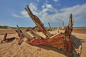 Hidden Gems Prints: The remains of a wrecked boat on sand flats at Crow Point