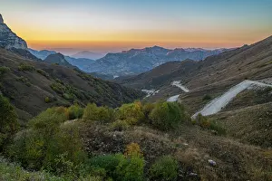 Season Prints: Remote mountain scenery in Chechnya offers a view of the Caucasus at sunset in Russia