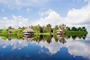 Heritage Site Prints: Replica native village in Treasure Lagoon