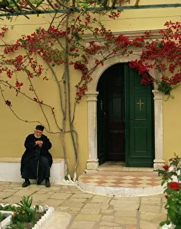 Door Collection: Resident monk at chapel door, Paleokastritsa Monastery, Corfu, Ionian Islands