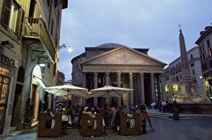 Illuminating Prints: Restaurant and the Pantheon illuminated at dusk