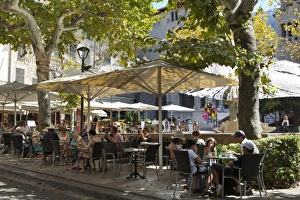 Group Of People Prints: Restaurant in Placa de la Constitucio, Soller, Mallorca (Majorca), Balearic Islands