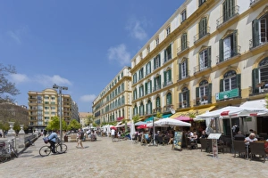 Cycling Prints: Restaurants and cafes in Plaza de la Merced, Malaga, Costa del Sol, Andalusia, Spain