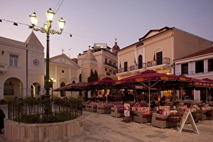 Clock Prints: Restaurants at dusk, St. Markos Square, Zakynthos Town, Zakynthos, Ionian Islands
