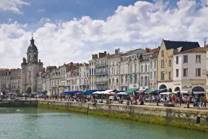 Charente Maritime Prints: Restaurants lining the edge of the marina in the ancient port of La Rochelle
