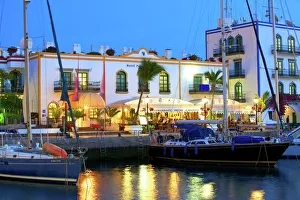 Restaurant Prints: Restaurants in Puerto de Morgan at dusk