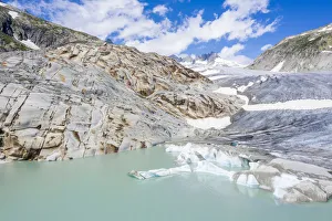 Rhone Glacier and glacial lake at its base in summer, aerial view, Gletsch, Canton