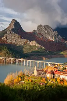Riano cityscape at sunrise with mountain range landscape during autumn in Picos de Europa