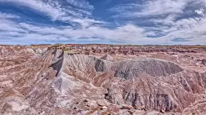 Sedimentary Rock Prints: A ridge of gray bentonite viewed from a nearby flat top mesa on the south end of Petrified Forest National Park