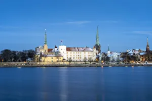 Rigas skyline and President Castle at night in winter, Old Town, UNESCO World