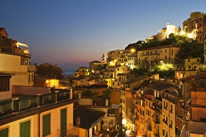 Riomaggiore Prints: Riomaggiore rooftops and the Castle at dusk