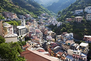 Riomaggiore Prints: Riomaggiore rooftops with the Church of St