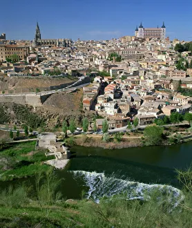 New Castile Prints: The river below the city of Toledo in Castilla la Mancha, Spain, Europe