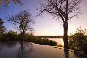 The River Club lodge, sunset on Zambesi River, Zambia, Africa