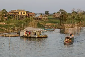 Traditionally Cambodian Prints: River family living on the Tonle Sap River in Kampong Chhnang