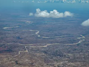 Uninhabited Prints: River flows through mountains from Antanavarino to Anjajavy Private Reserve in Madagascar