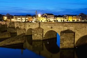 River Otata and Kamenny Most, the oldest Gothic stone bridge in Czech Republic during twilight, Pisek, Budejovicko