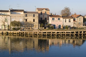 Languedoc Prints: Riverside, Aigues-Mortes, Languedoc, France, Europe