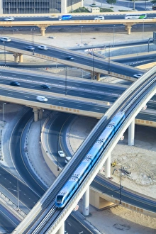 Elevated Road Prints: Road interchange and Metro train, Dubai, United Arab Emirates, Middle East