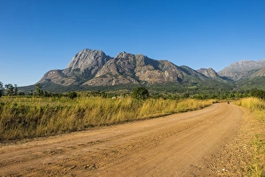 Road leading to the granite peaks of Mount Mulanje, Malawi, Africa