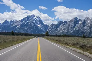 Teton Range Prints: Road leading in the Teton range in the Grand Teton National Park