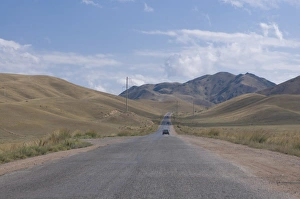 High Way Prints: Road leading into the Tian Shan mountains, Kyrgyzstan, Central Asia